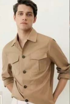Model wearing a tan utility overshirt
